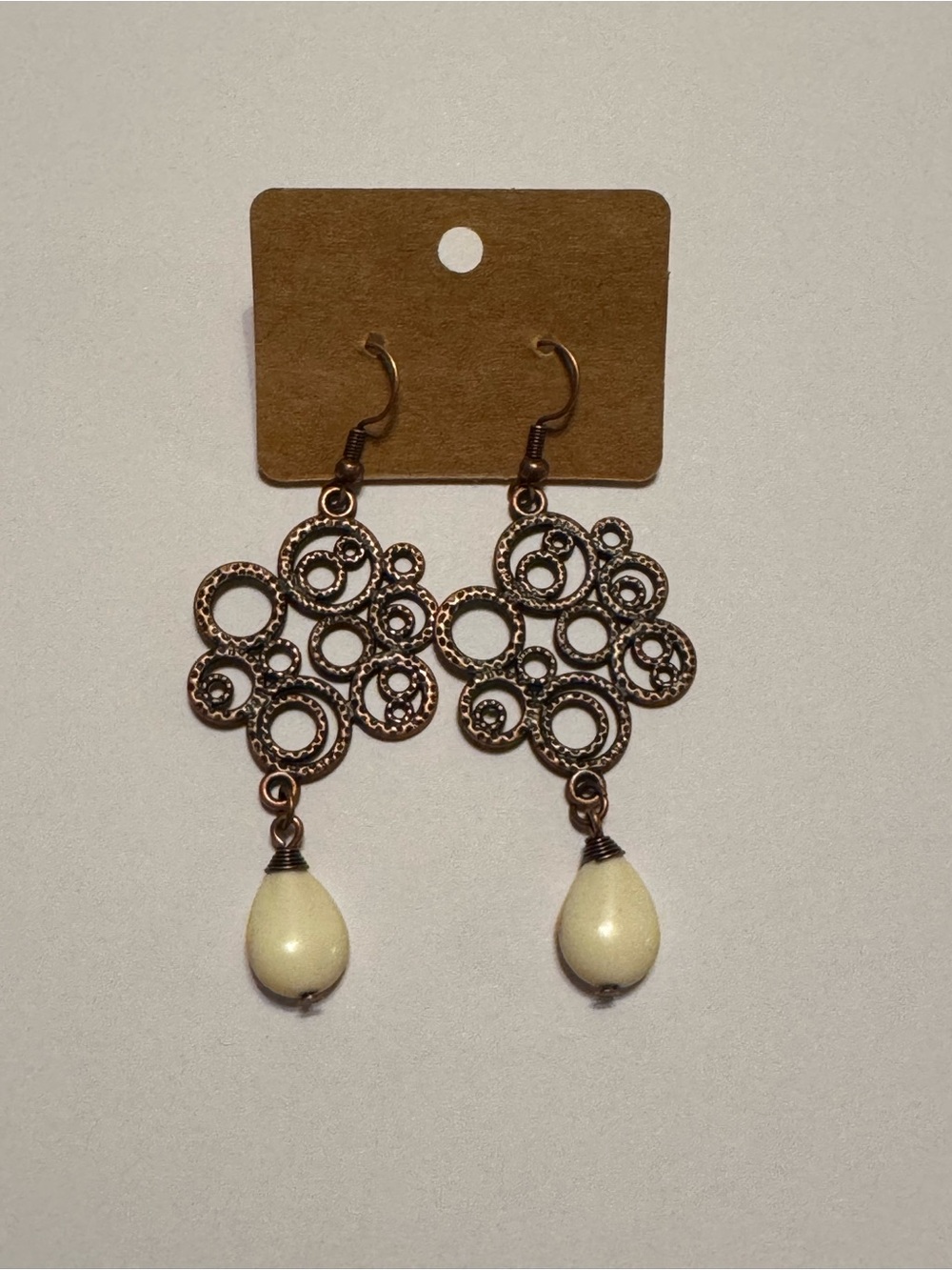 Copper Tone Bubble Circle Drop Earrings with Ivory Teardrop Beads